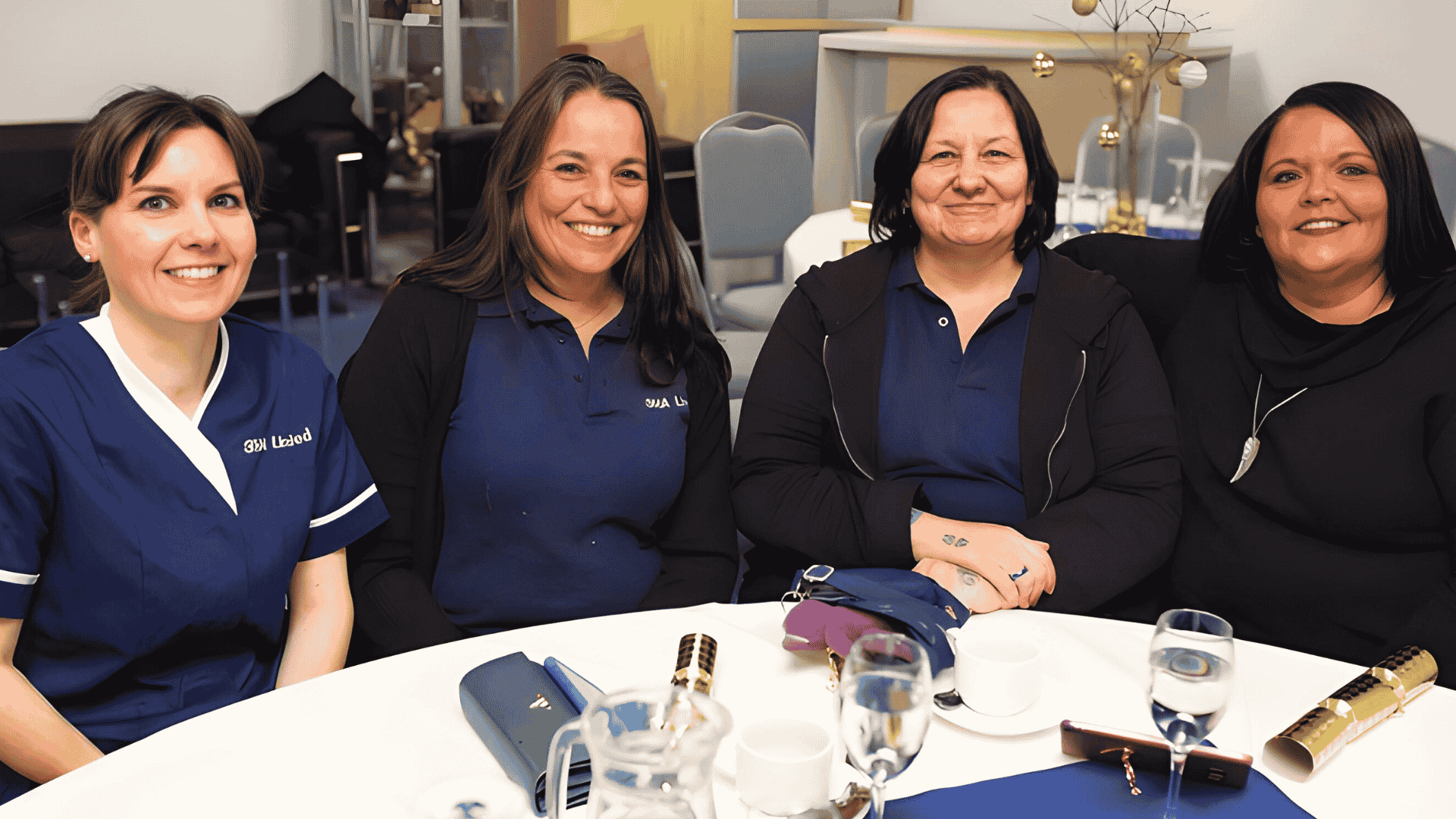 Professional caregiver providing compassionate support to an elderly client at home